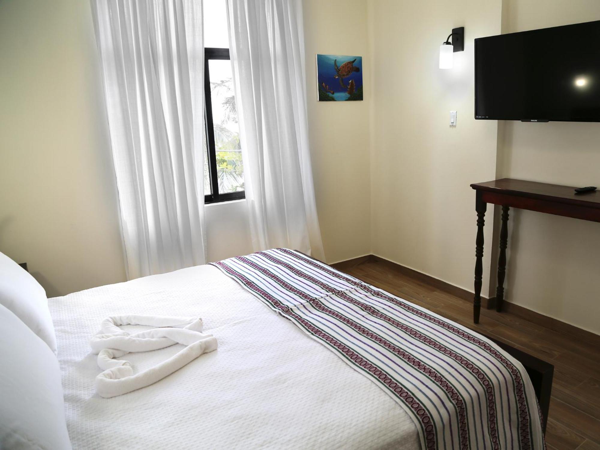 Jan'S Hotel Caye Caulker Quarto foto